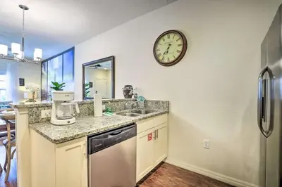 a kitchen with a sink and a clock on the wall at Marvelous 3 Bd Close To Disney @ Lucaya Resort 107 5364 in Kissimmee