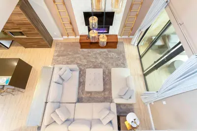 an overhead view of a living room with white furniture at Gorgeous 4Bd Close to Disney @ Magic Village 7581 in Orlando