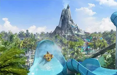 a water park with a mountain in the background at Bposhtels Orlando Florida Mall in Orlando