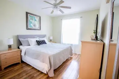 a bedroom with a bed and a ceiling fan at Windsor Palms Resort 3 Bedroom Condo 6 Miles to Disney in Kissimmee