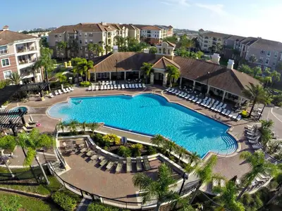 an aerial view of a swimming pool at a resort at 3Br 2Bath Condo Balcony 5min Conv Center 1388ft in Orlando