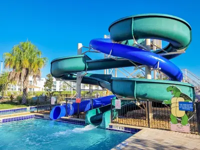 a water slide at a water park at 5Br 5Bath Pvt Home BBQ Pool 10min Disney 3077ft in Kissimmee