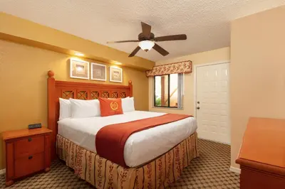 a bedroom with a large bed and a ceiling fan at Westgate Vacation Villas Resort in Orlando