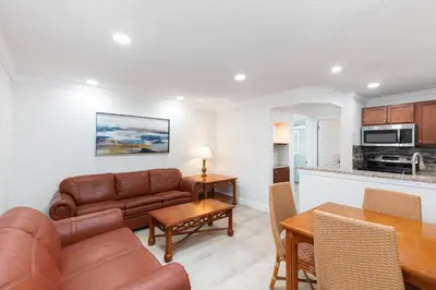 a living room with a couch and a table at Westgate Blue Tree Resort in Orlando