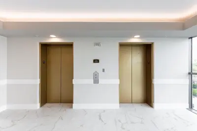 a row of elevators in a building with doors at Westgate Palace Hotel - Universal - I-Drive in Orlando