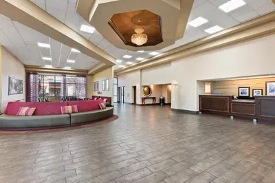 a large lobby with a waiting area and a waiting room at Orlando Palms in Orlando