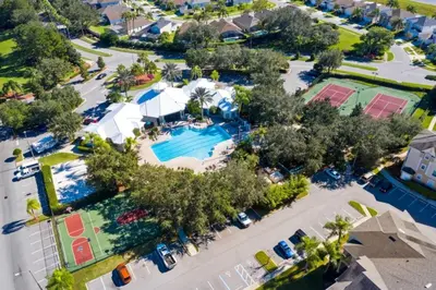an overhead view of a pool at a resort at 4 Bedroom 3 Bath South Facing Pool Spa Villa villa in Kissimmee