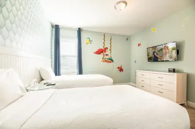 a bedroom with two white beds and a window at Gorgeous Home With Media, Disney Themed Kids Room Near Disney With Waterpark & Resort Access At Encore Resort - 771La in Kissimmee