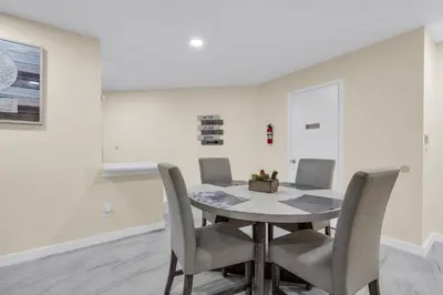 a dining room with a table and chairs at Orlando Vacational Apartment 3919 in Orlando