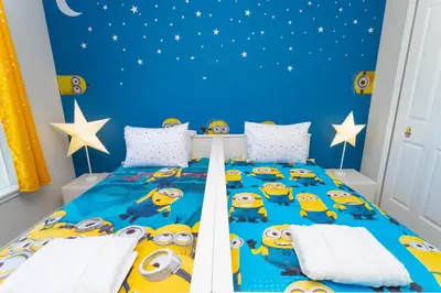 a childs bedroom with a bed with a disney cars bedspread at Gorgeous and New House at Le Reve Resort (214221) in Kissimmee