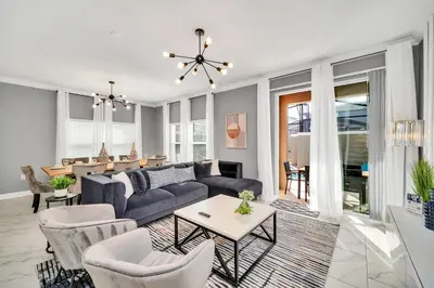 a living room with a couch and a table at 4200 Paragraph Drive in Kissimmee