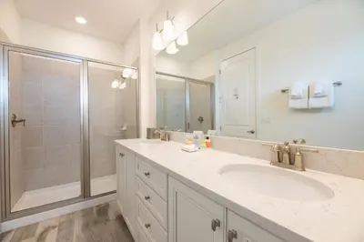 a bathroom with a sink and a shower at Seaweed Paradise Cottage Near Disney With Margaritaville Resort & Island H2O Access - 8057Kd in Orlando