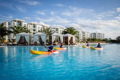 a group of people kayaking in the water at a resort at Evermore Orlando Resort in Orlando