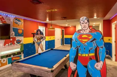 a bedroom with a superhero room with a trampoline at Magical Family Home 8min Disneyworld Pool/Spa Sleeps 22 in Kissimmee