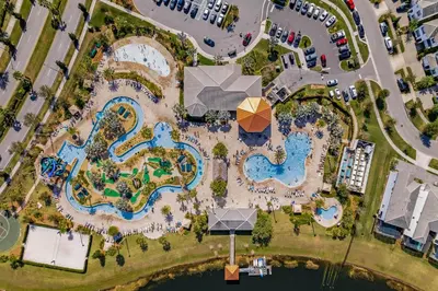 an aerial view of a pool at a resort at Beautiful Family Villa - Pool and Hot Tub - Near Disney World in Kissimmee