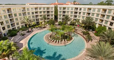 an aerial view of a large building with a swimming pool at Hotel Apt at Celebration 10 min from Disney MH225 in Orlando