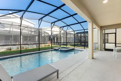 an indoor swimming pool with a large glass ceiling at Sophisticated 6BR at Storey Lake SL2766 in Kissimmee