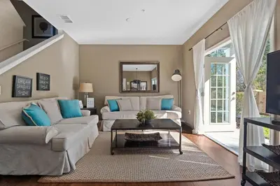 a living room with a couch and a table at Cozy Decor 4BR at West Lucaya Resort WL8972 in Kissimmee
