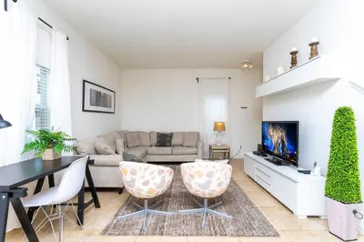 a living room with a couch and a table at 4572 Perfect home for your family close to all parks in Kissimmee