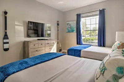 a bedroom with two beds and a window at Vista Cay Resort Condo about 5 Mi to Universal! in Orlando