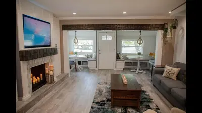 a living room with a couch and a fireplace at Family Home with Private Pool Yard Only 24 Mi to Disney in Saint Cloud