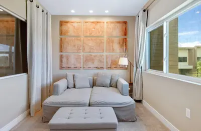 a living room with a couch and a window at Cozy Home Resort Community Disney 5 Min in Orlando