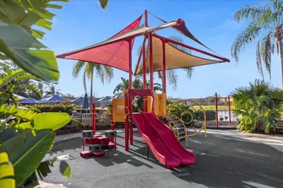 a playground with a slide and a slideintend at 3 Bedrooms 25 Bathrooms Encantada 3091 Yl in Orlando