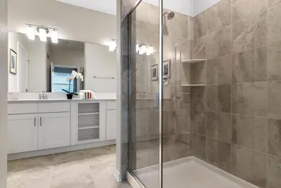 a bathroom with a shower and a sink at 2 Bedrooms 2 Bathrooms Storey Lake 3150-404 Pc in Kissimmee