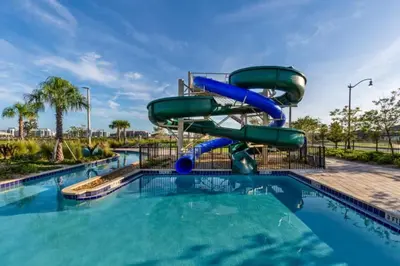a water slide at a water park at 4 Bedrooms 3 Bathrooms Storey Lake 3195 Pp in Orlando