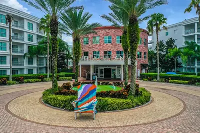 a beach chair in front of a building at Pet Friendly in Orlando area near Disney in Orlando