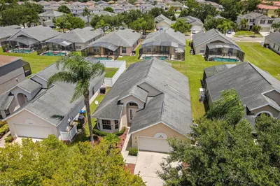 an aerial view of homes in a residential neighborhood at Disney Area 4BR Home with Heated Private Pool in Kissimmee