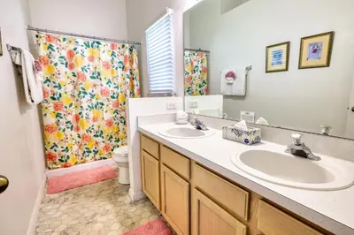 a bathroom with a sink and a shower at Clear Creek 3 Bedroom Home Private Pool 15 Min to Disney in Orlando