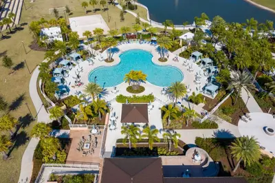 an overhead view of a pool at a resort at 1798 TP - 4BR Luxury Solara Retreat Pool Disney in Orlando