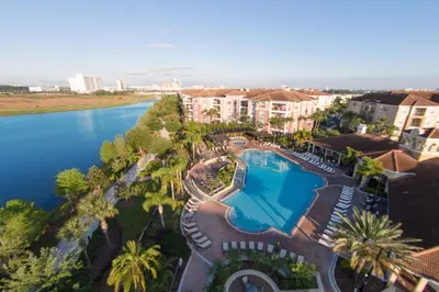 an aerial view of a resort with a swimming pool at Epic Universe Vista Cay Lakeview Condo - 1019 in Orlando