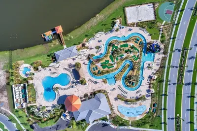 an aerial view of a pool at a resort at Blue Toucan At Storey Lake By Shine Villas #402 in Kissimmee