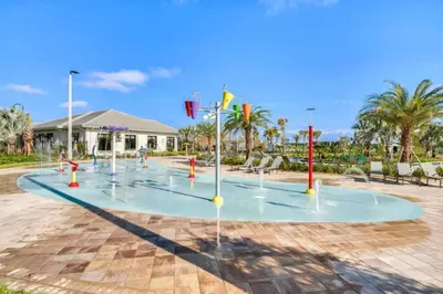 a water park with a bunch of water fountains at Edgewater Escape At Storey Lake By Shine Villas #904 in Kissimmee