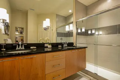 a large bathroom with a sink and a shower at 1523 Cozy Astonishing wPrivate Pool in Orlando
