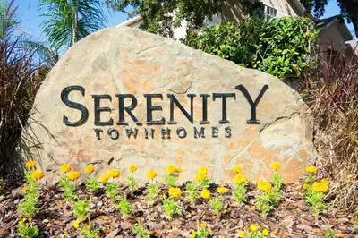 a sign for a serifonym town homes at 1523 Cozy Astonishing wPrivate Pool in Orlando
