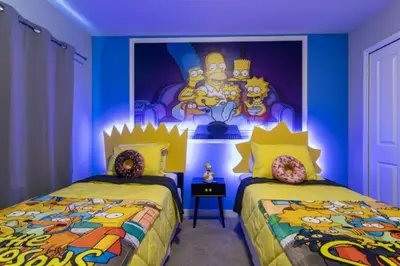 two beds in a room with a disney bedroom at Modern 4 bedroom Home Private Pool 4451 in Kissimmee
