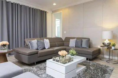 a living room with a couch and a coffee table at Luxurious Home Private Pool 2693 in Kissimmee