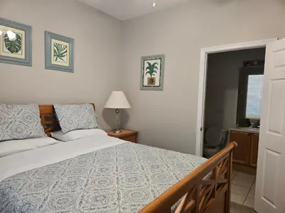 a bedroom with a bed and a window at Veteran Owned 3bdr/3 bath Townhouse w/WiFi 3mi to Disney - Fall/Winter Specials in Kissimmee