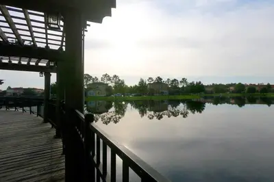 a view of a body of water with a dock at Newly Renovated Stylish Villa with Star Wars Mickey and Safari Themed Rooms #3TV4706 in Kissimmee