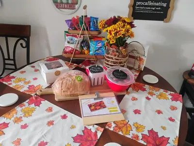 a table with a table cloth with a tableablish at La Maison de Lorbu - Apartment in Orlando