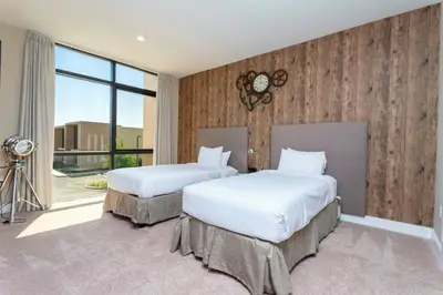 a bedroom with two beds and a window at 4 Suites - 5 min from Disney - w Jacuzzi 7557 in Orlando