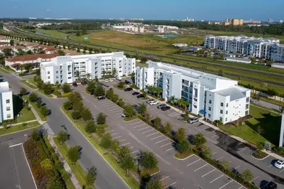 an aerial view of a city with white buildings at Resort Near Disney FREE Waterpark 4741 in Kissimmee