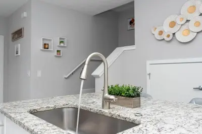 a kitchen counter with a sink in a kitchen at Mickey Safari near Disney 2 Master rooms 4708 in Kissimmee