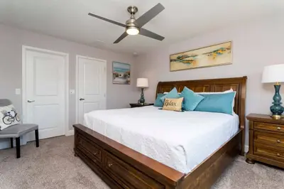 a bedroom with a bed and a ceiling fan at Mickey Safari near Disney 2 Master rooms 4708 in Kissimmee