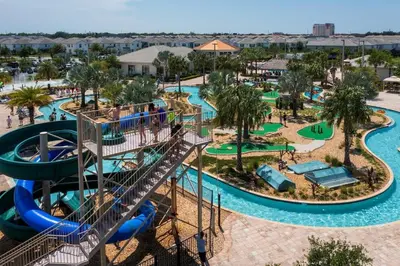 an aerial view of a water park at a resort at free resort access, private pool near disney 2966 in Kissimmee