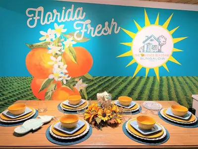 a table with dishes and a sign that reads india fresh at FUN! PoolLake near Disney Fast WiFi Pickleball in Clermont