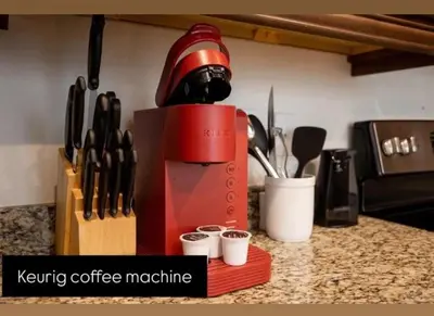 a red coffee machine sitting on top of a counter at 431 Villa - Spacious 7BD - Screened PoolSPA in Orlando
